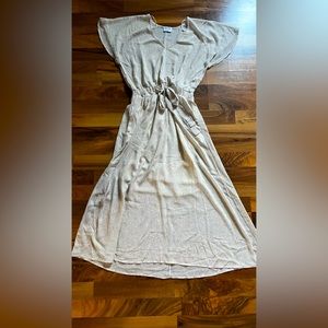 Woman’s medium never worn gold and off white long dress with tie at waist